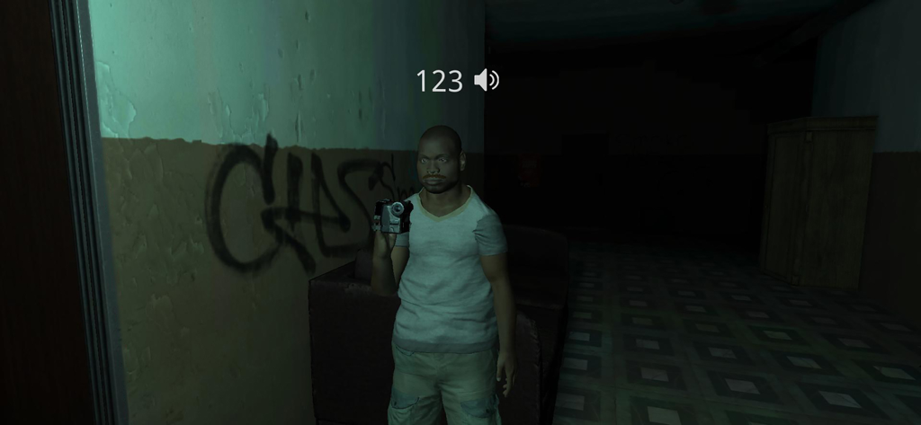 A male character survivor holding a video camera in a dark haunted hallway with graffiti on the walls