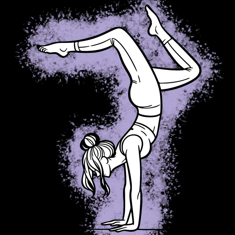 a woman doing a handstand