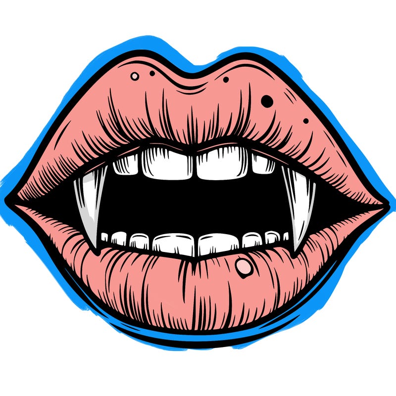 lips with vampire teeth
