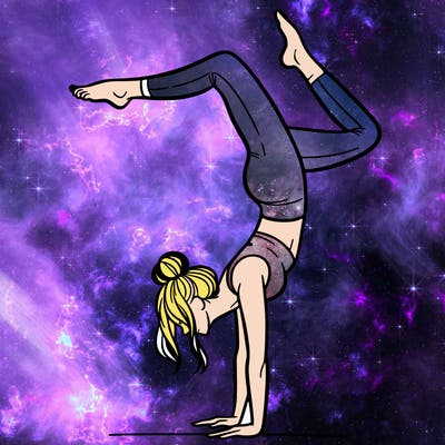 a woman doing a handstand