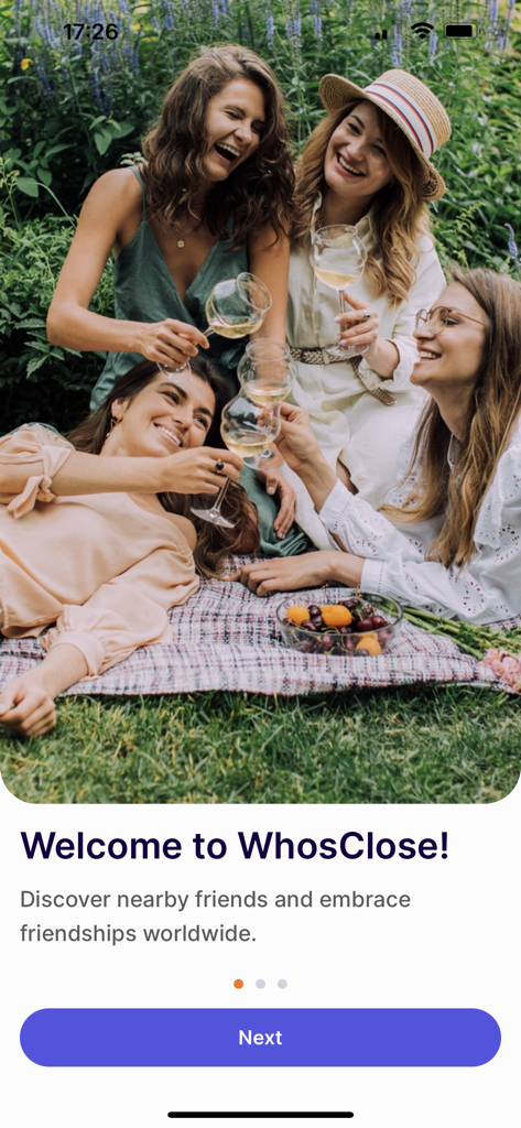 WhosClose - Écran d'accueil de l'application WhosClose montrant des amis profitant d'un pique-nique pour promouvoir les connexions du monde réel