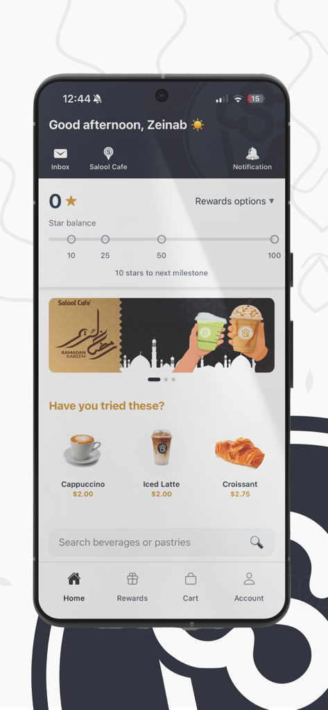 Salool Cafe - Salool Cafe mobile app home screen showing rewards balance and featured menu items like coffee and croissants.