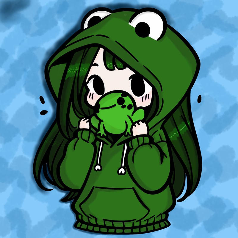 a girl holding a froggy hoodie