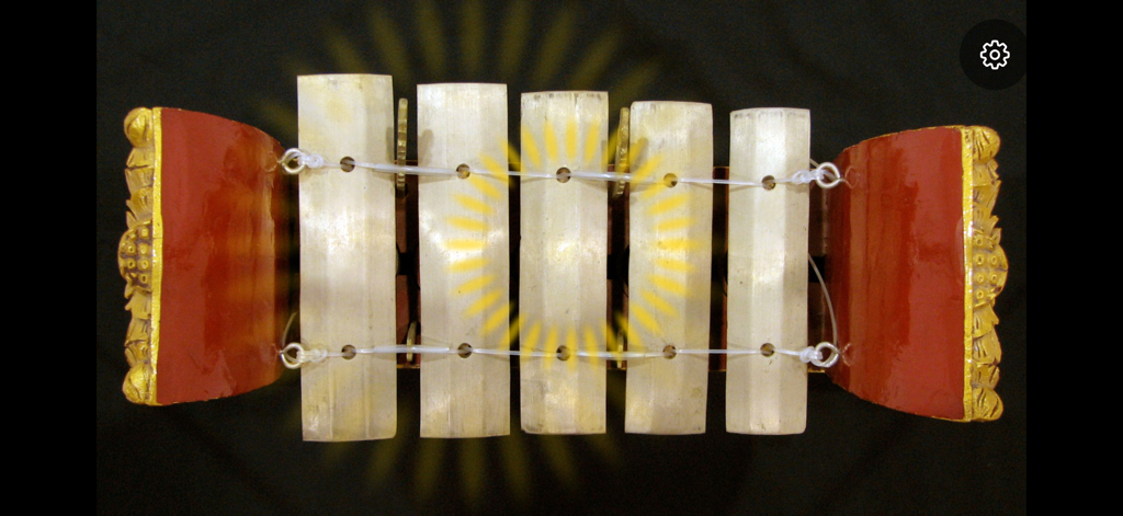 Gangsa - Top down view of the Gangsa app interface featuring a digital Balinese Gamelan instrument with visual feedback