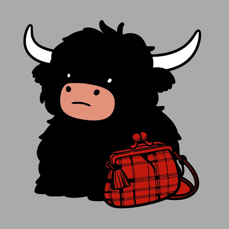 highland cow in a purse