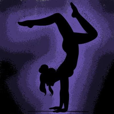 a woman doing a handstand