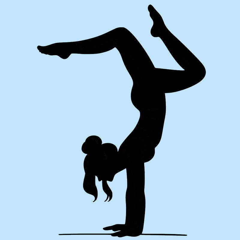 a woman doing a handstand