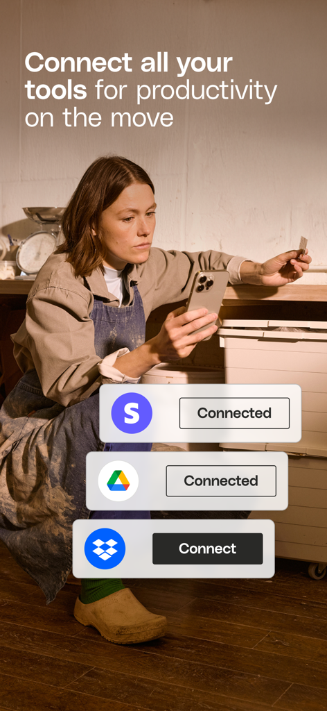 Entrepreneur using Qonto app to connect business tools for mobile productivity