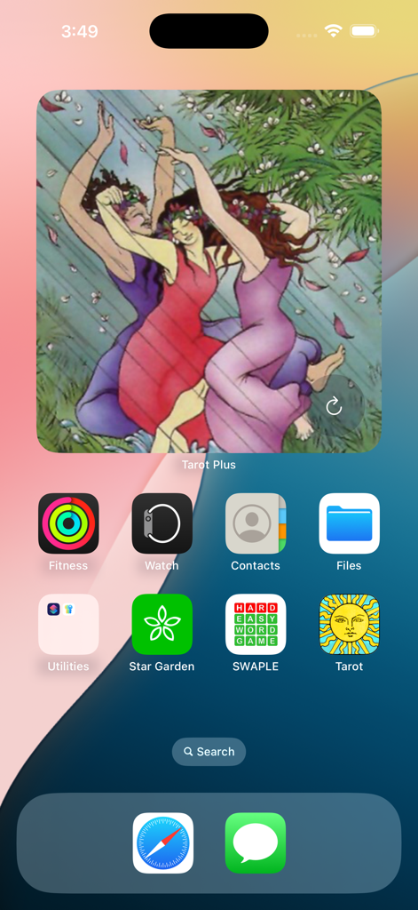 A colorful tarot card widget from the Mystic Tarot Plus app on an iPhone home screen.