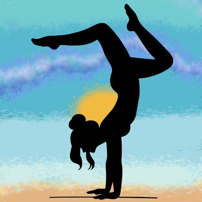 a woman doing a handstand