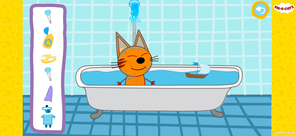 A day with Kid-E-Cats - Un personaje de gato de dibujos animados de Kid-E-Cats bañándose con un barco de juguete y artículos de higiene