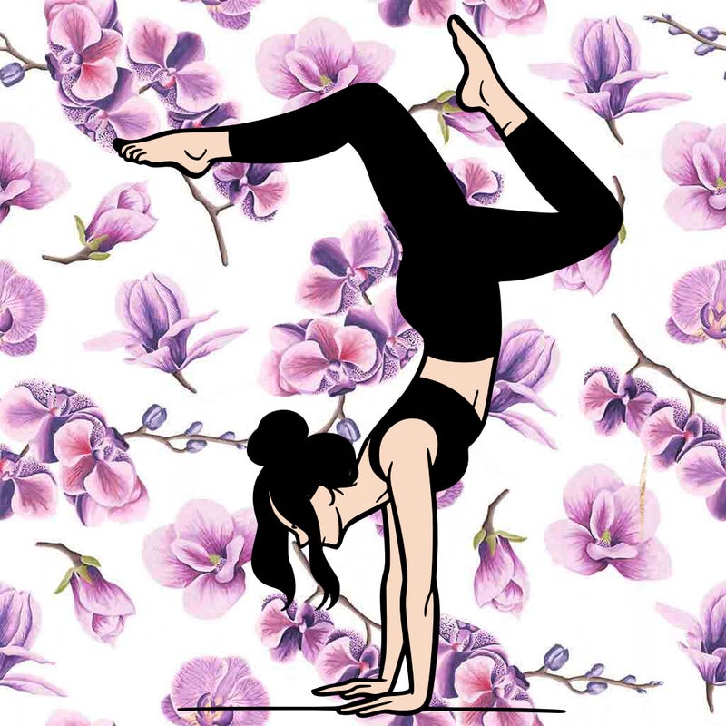 a woman doing a handstand