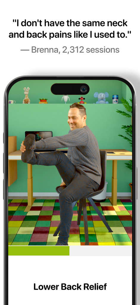A man performing a seated leg stretch at a desk for lower back pain relief.