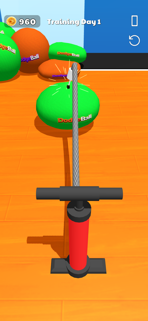 A training level in Dodge The Ball 3D where a player uses a red pump to inflate colorful dodgeballs.