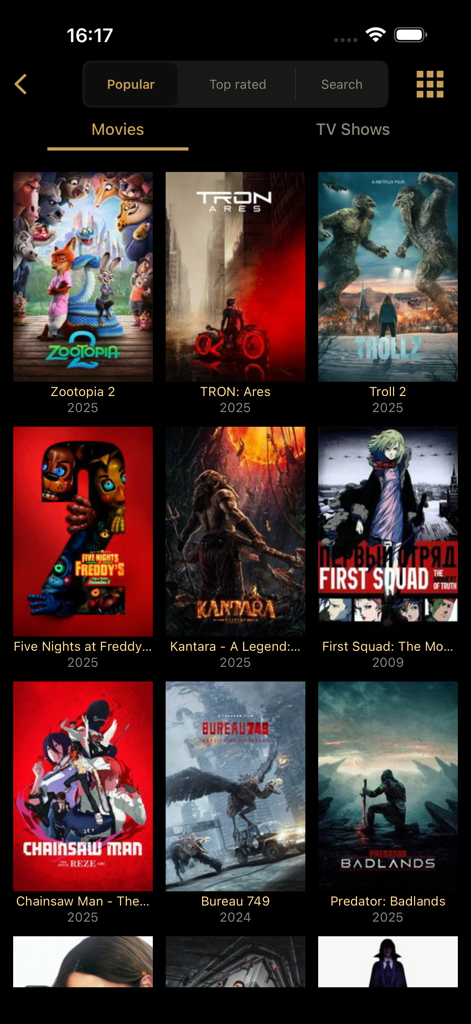 Watched TV: Movies & TV Shows - Una cuadrícula de películas populares con pósteres y fechas de estreno mostradas en la pantalla de descubrimiento de la aplicación Watched TV