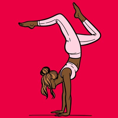 a woman doing a handstand