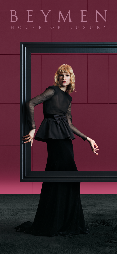 Elegant woman in a black luxury dress posing for Beymen House of Luxury