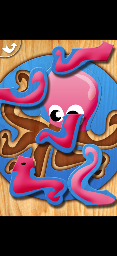 My First Puzzles - Puzle de pulpo rosa para niños pequeños en un juego digital con marco de madera.