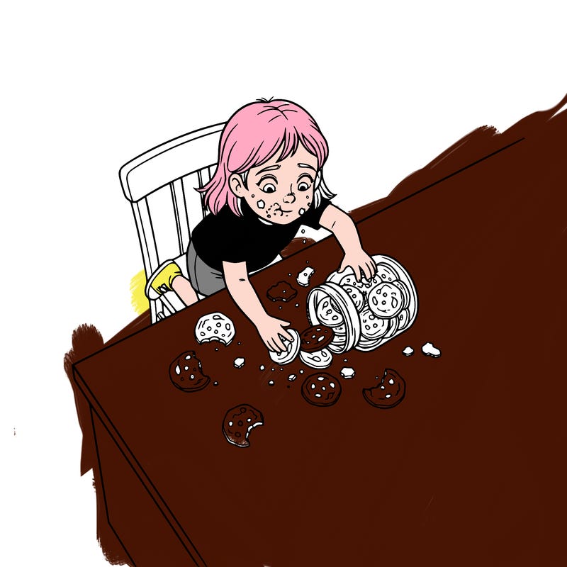 girl spying on cookies but eats them