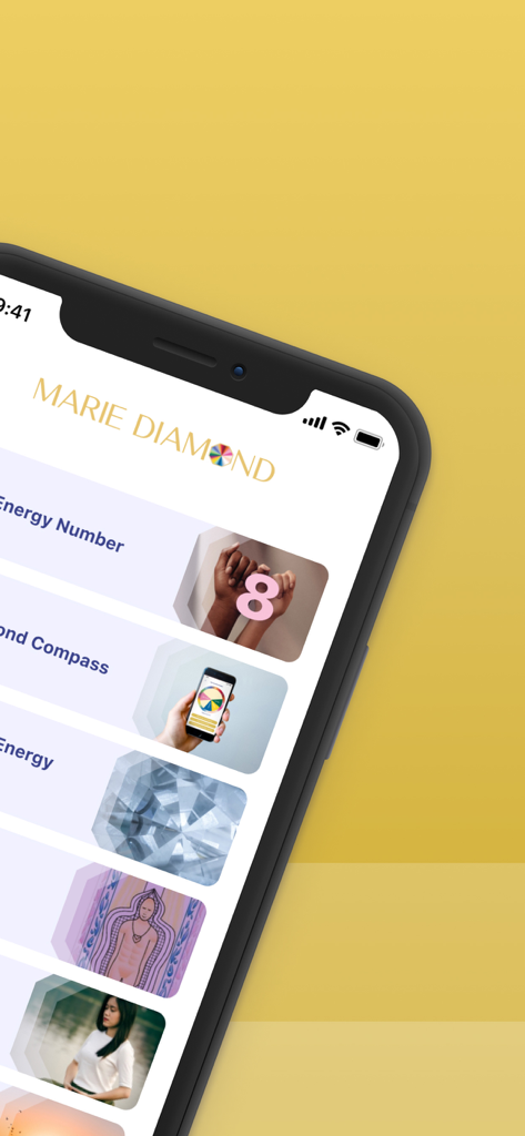Marie Diamond App-Oberfläche, die die Energiezahl und das Diamond Compass Menü anzeigt