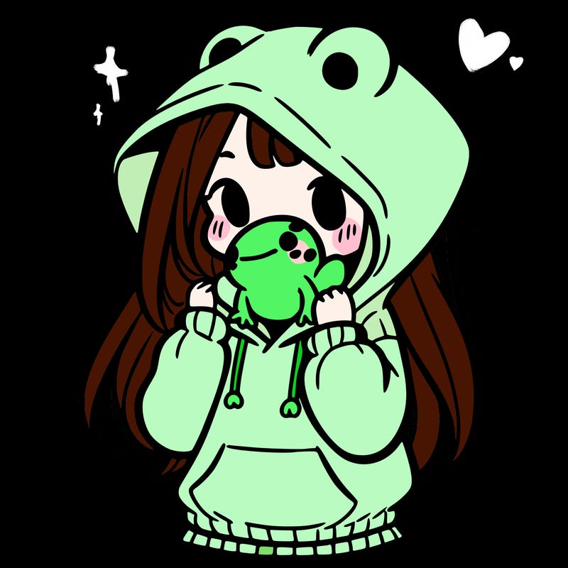 a girl holding a froggy hoodie