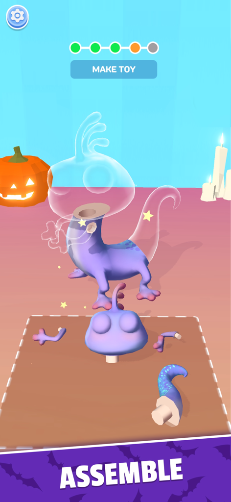 Assembling a purple 3D toy creature in the Toy Master game app