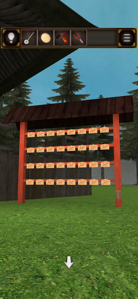 Red wooden rack with decorative votive tablets in a Japanese shrine courtyard