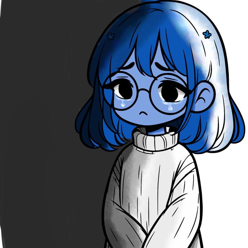 sad girl with glasses in a sweater