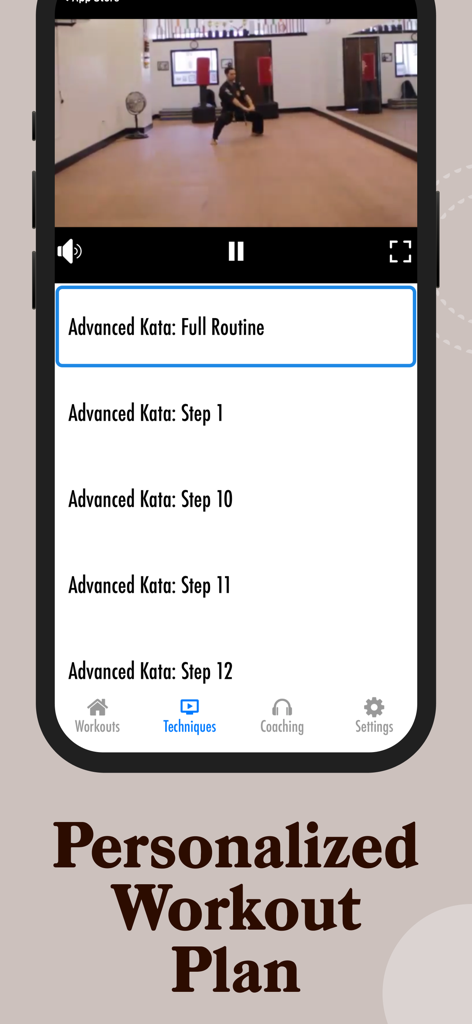A mobile phone screen showing the Cardio Kickboxing Workouts app interface with a video tutorial for an advanced kata and a personalized workout plan.