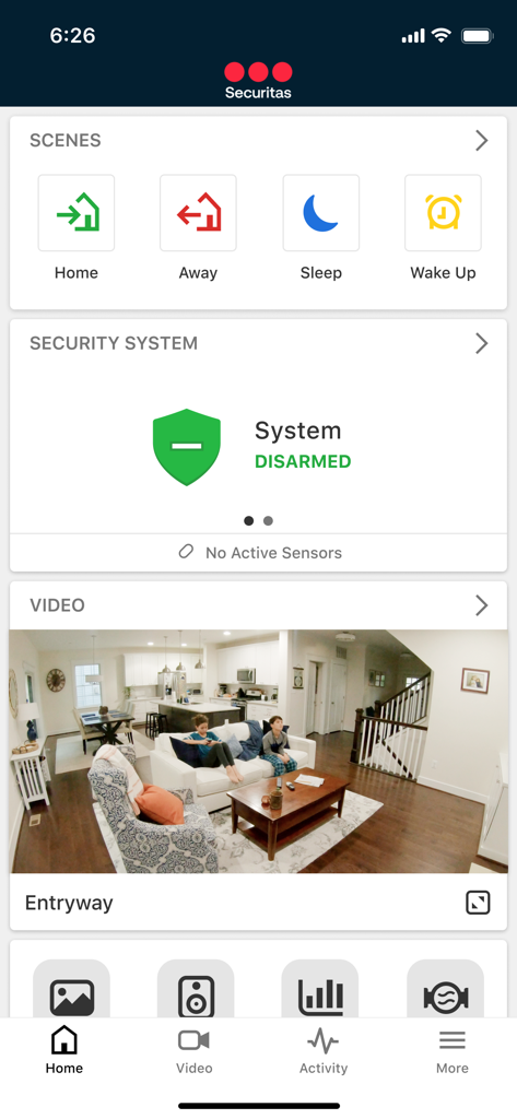 Securitas Connect mobile app home screen showing security system status and a live video feed of an entryway