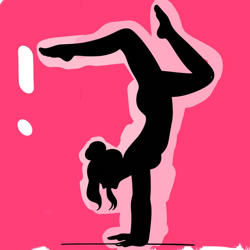 a woman doing a handstand