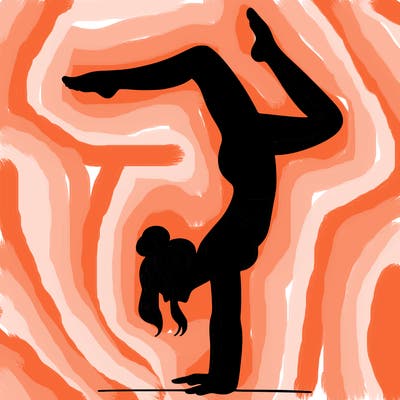 a woman doing a handstand