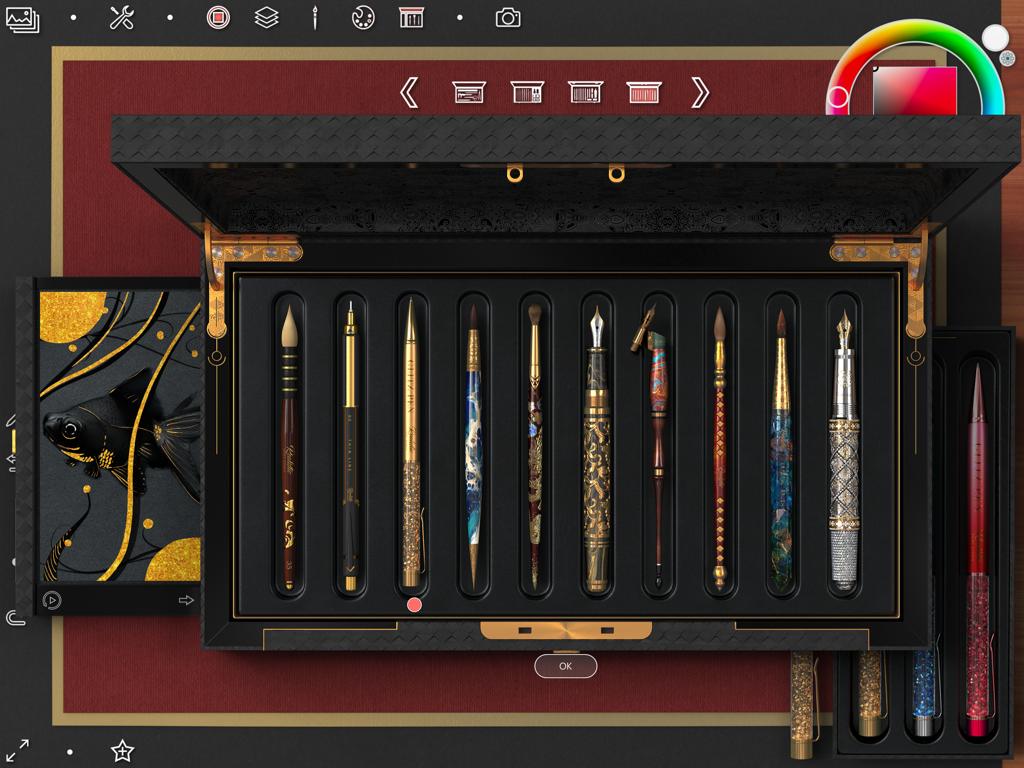 A collection of ornate digital brushes and pens displayed in a realistic art box within the app interface