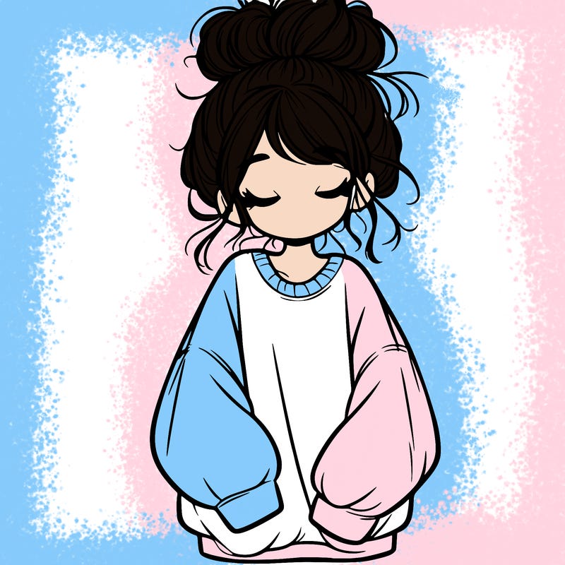 girl with baggy sweatshirt and messy bun