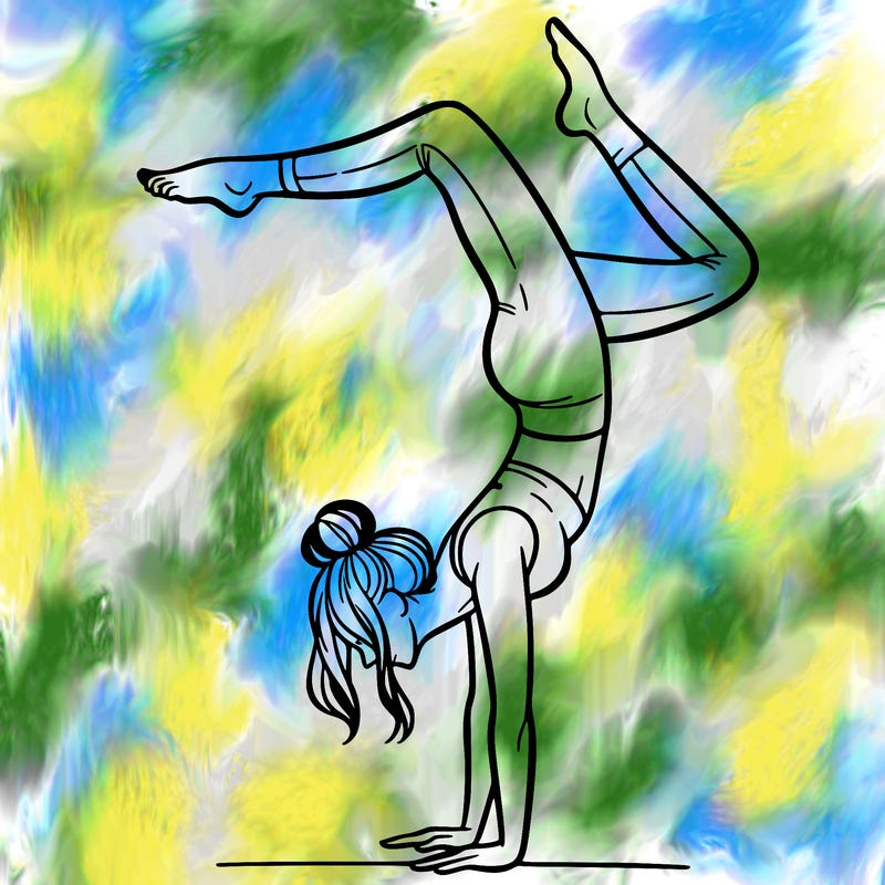 a woman doing a handstand