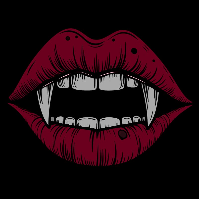 lips with vampire teeth