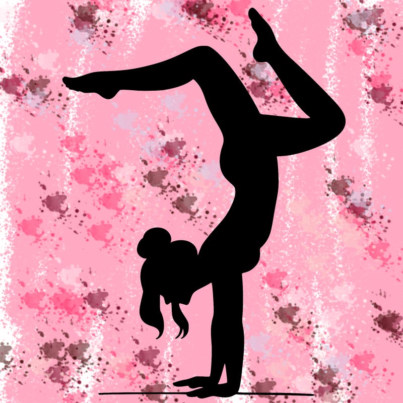 a woman doing a handstand
