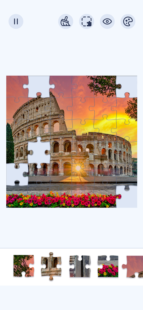 Jigsawgram: Jigsaw Puzzle - Gameplay screen of Jigsawgram showing a partially completed puzzle of the Colosseum in Rome at sunset.