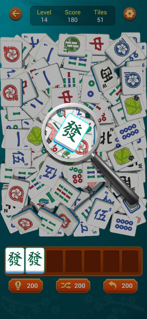 Gameplay screen of Mahjong Triple Match showing a pile of 3D tiles and a magnifying glass tool highlighting a specific tile