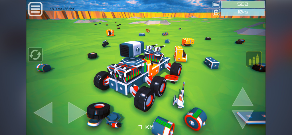 Un véhicule en blocs personnalisé avec des armes et des batteries dans un champ de sable vert