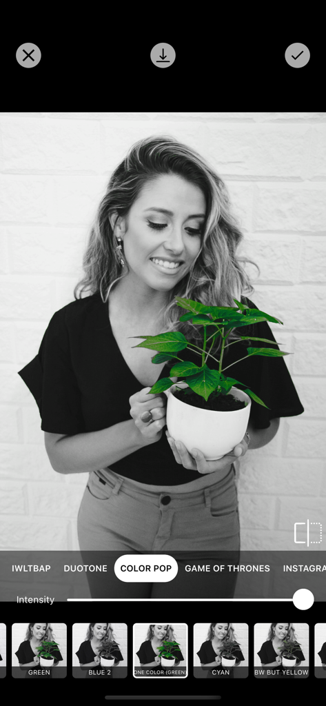 Photo Filters + - A woman holding a green plant in a selective color pop photo editor interface
