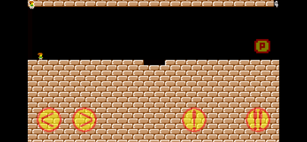 8-bit pixel art gameplay from TrapAdventure 2 showing a character on a brick level with on-screen controls