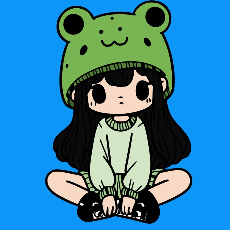 a girl wearing a frog hat and some frog socks