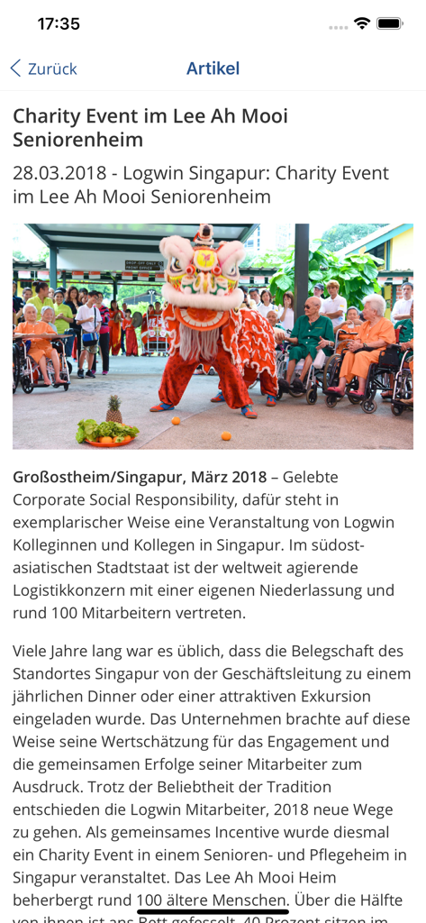 News article within the Logwin app detailing a corporate social responsibility charity event in Singapore