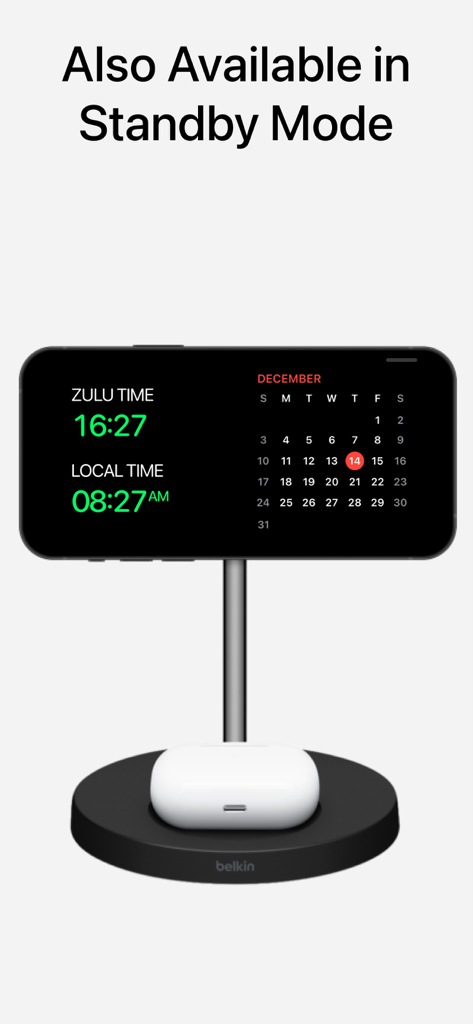 iPhone displaying Zulu and local time in Standby Mode on a charging stand
