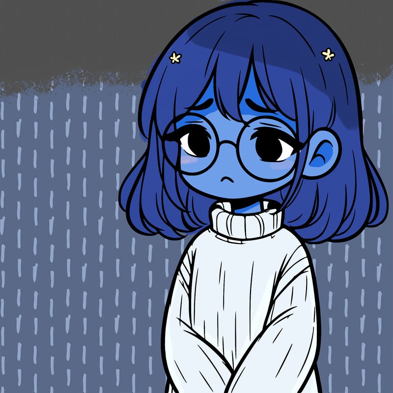 sad girl with glasses in a sweater