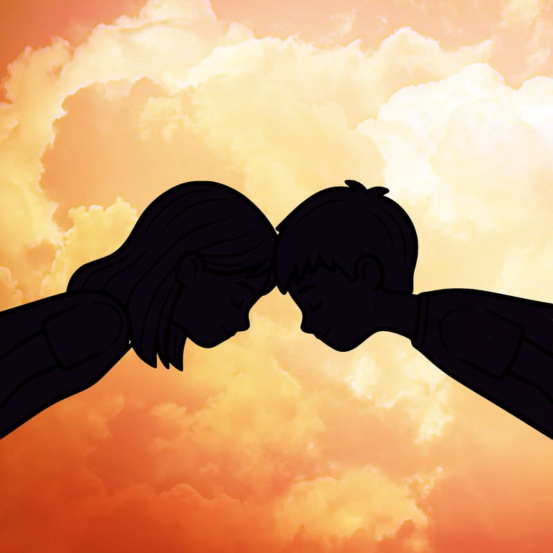 girl and boy turned to each other with there forehead’s against each other’s
