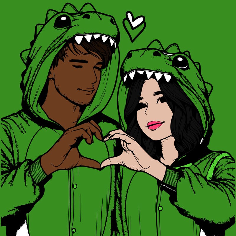 realistic couple wearing matching dinosaur onesies with heart hand gesture