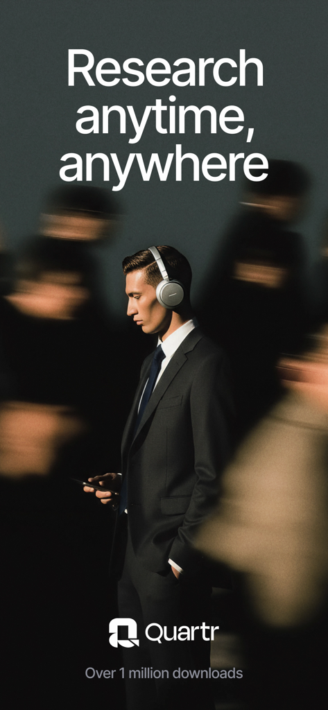 Quartr: Financial Research - A professional man in a suit wearing headphones and using the Quartr app for financial research