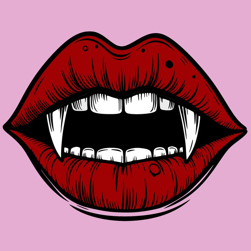 lips with vampire teeth